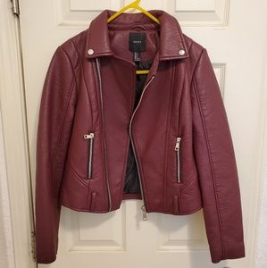 Burgundy jacket.
